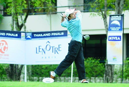 A competitor tees off on the challenging Thana City golf course. 