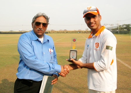 Pattaya Cricket Club’s Sunny Hanif, right, receives his Man of the Match award after his fine all round display against AIT Elite. 