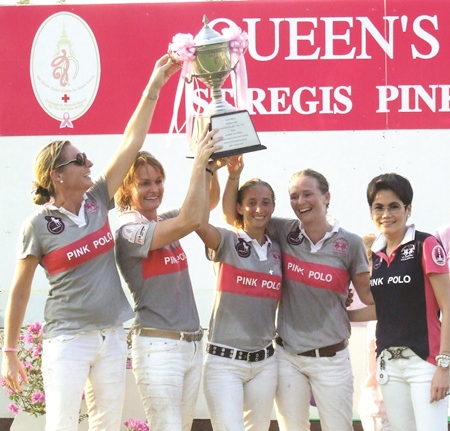 The victorious Thai Polo team (from left) Isabel von Morgenstern, Claudia Zeisberger, Ina Oettinger-Wallerstein and Caroline Link receive the trophy from ML Khunying Piyapas Bhirombhakdi (right) acting as representative for Her Majesty The Queen.