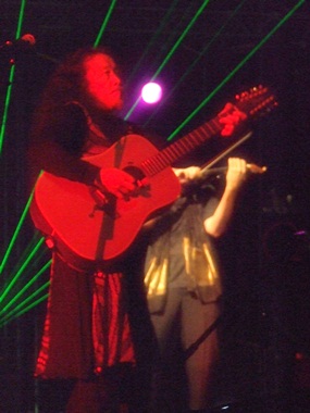 Kitaro plays guitar during one of his compositions.