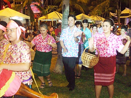 Mayor Itthiphol Kunplome takes part in the procession.