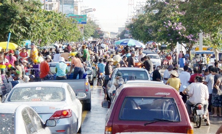 It’s that time of year again, when the streets turn to rivers, water throwing madness rules and general mayhem ensues.  Yes, Songkran is here, Thai New Year, the annual water festival.  Drive carefully and be prepared to get wet unexpectedly at any time whilst walking, especially in and around the entertainment areas. Also expect traffic to be at a standstill, especially on April 19 in Pattaya, similar to this situation on 3rd Road last year. (Pattaya Mail photo courtesy of Tom Brown) 