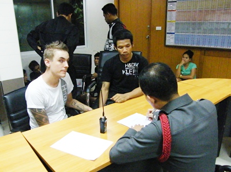 John Peter Josefson, shown here handcuffed to another drug suspect, was arrested after testing positive for illegal drugs. 