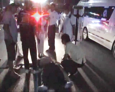 Emergency services tend to the dead man