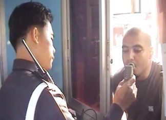 Alcohol control on motorbike riders Motorcyclist takes the breath test