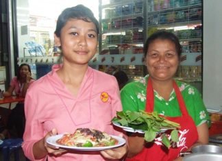 It’s ready to serve: Sompong Prachariko and her daughter Sukalyani Prachariko prepare to serve mom’s signature dish, “Larb Ped Buriram,” or Buriram Spicy Minced Duck Salad.