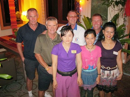 Tuesday’s winners pose with staff members at The Relax Bar.