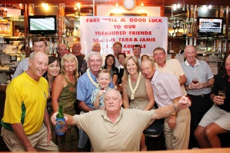 Seamus Cotter, front center, and his family say farewell to their friends at Lewiinski’s 
