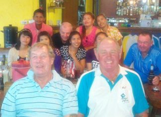 Barry Chadbourn & Capt’ Bob relax after their win in the Songkran scramble on Tuesday. In the background are some of the caddies with Sel Wegner and Geoff Moodie.