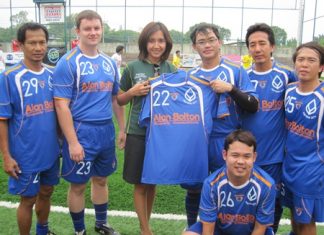 Congratulations go to the victorious Bangkok Bank Pattaya FC team, shown here with Wanitchaya, 3rd left, from their sponsors Alan Bolton Property Consultants.