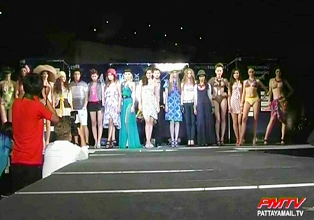 The models led by Natalie Glebova take to the catwalk