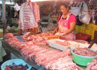 Saibua Hatyoung, a pork vendor at South Pattaya’s Wat Chaimongkol Market, says prices are higher than she’s seen in a decade and, as a result, her business is off 50 percent.