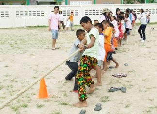 The youngsters learn teamwork during the tug-o-war event.