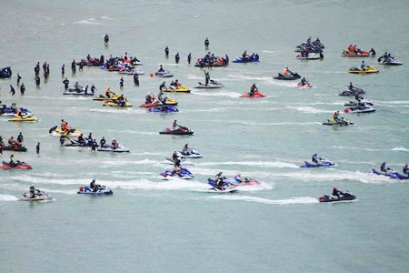 Some of the 84 adventurous jet ski riders prepare to set out across the Gulf of Thailand. 