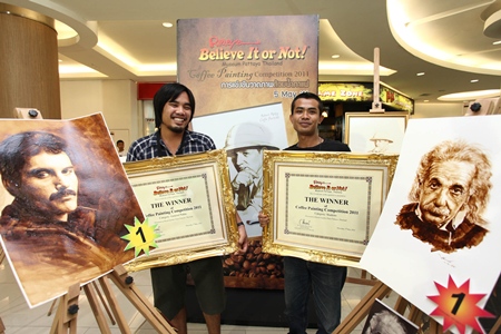 Jintanakarn Maneerat (left) won top prize for his painting of Freddie Mercury, whilst Ruangyot Kungsasri (right) won the student category for his drawing of Albert Einstein.  