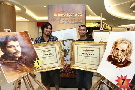 Jintanakarn Maneerat (left) won top prize for his painting of Freddie Mercury, whilst Ruangyot Kungsasri (right) won the student category for his drawing of Albert Einstein.