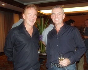 Alan Ewens (left) discusses golfing with Craig Muldoon (PFS International).