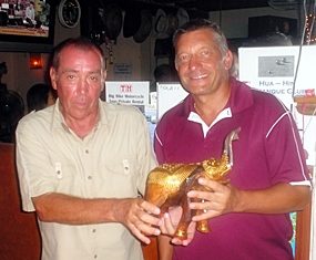 Alan Pilkington, right, is presented with the Golden Elephant trophy by Glyn Evans.