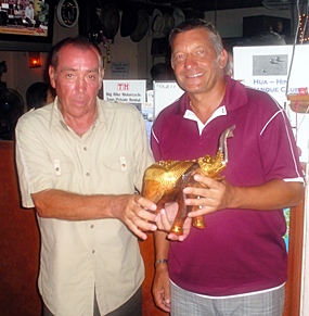 Alan Pilkington, right, is presented with the Golden Elephant trophy by Glyn Evans.