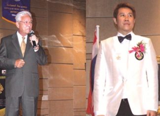 (Left) Kajit Habanananda, Lions Clubs International Past President, (Right) Banchong Bunthoonprayuk District Governor 310C (2011-12).