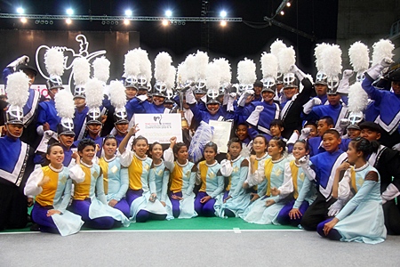 Marching band members cheer for their success.