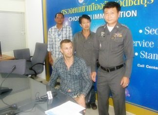 Alleged Russian drug dealer arrested hiding in Pattaya Chonburi Immigration Police have arrested Andrey Kozlov (seated) on a request from a Vladimir, Russia court.