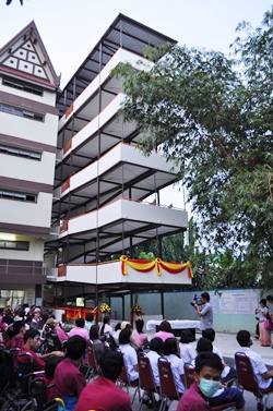 Students and faculty gather for the official opening of the new multi-floor ramp system. 