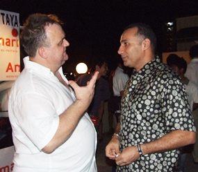 Engrossed in conversation: (from left) Michael Procher and H.E. Nabil H. Ashri.