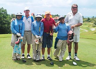 B1, Stuart Thompson and Rosco Langoulant line up with their caddies on the Seaview golf course, Friday, June 3.