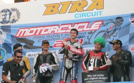 Ben Fortt, centre, celebrates his win in the 1000cc superbike rookie class event at Bira Circuit, Sunday, May 29. 