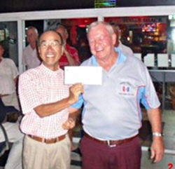 Low Gross winner Mashi Kaneta, left, with the PSC Golf Chairman Joe Mooneyham.
