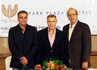 From left: Kobi Elbaz (CEO Tulip Group), Eli Papouchado (Chairman Park Plaza Hotels Group), and Boris Ivesha (CEO Park Plaza Hotels Group) address the assembled media and real estate representatives at a meeting held at the Centara Grand Mirage Beach Resort Pattaya on Tuesday, July 26 to announce the new Park Plaza Waterfront project.