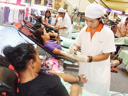 Staff and customers at Big C in North Pattaya donate blood to benefit the Red Cross. 