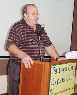 Chairman Michel de Goumois presents the report for the 2010 / 2011 year for Pattaya City Expats Club.