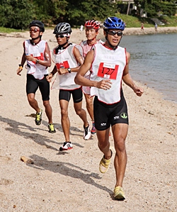 Competitors run along the beach during last year’s Koh Samui adventure race. 