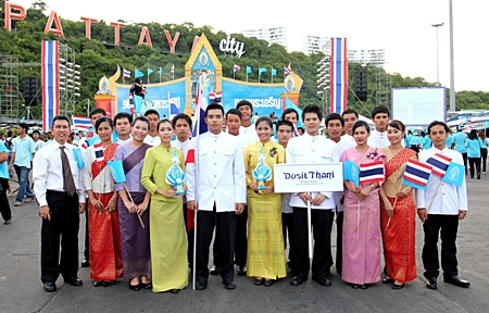Thanathorn Phongsri (left), Human Resources manager of the Dusit Thani Pattaya together with the hotel staff took part in the parade along Beach Road ending at the Bali Hai pier where the city had arranged colorful celebrations in honor of her Majesty the Queen’s 79th birthday on August 12.