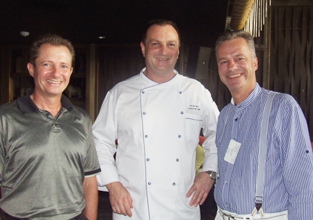 Carl-Fabian Arp (left), managing director of Thai-Ger Line Golf; and Ingo Raeuber (right), general manager of the Pinnacle Grand Resort & Spa, thank Peter Held (center), executive chef at the Centara Grand Mirage Beach Resort Pattaya for the great spread of food he put on.