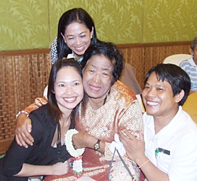 (Clockwise from left) Woranuch Suhsang, Sunne Weawmanee and Pramoal Iamma bring tears of joy to Grandmother Charoen Umphaiwong.