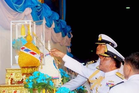Adm. Narong Teswisan, Commander in Chief of the Royal Thai Fleet, presides over the candle lighting ceremony in Sattahip to bless Her Majesty the Queen.
