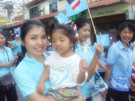 Pattaya residents young and old take part in the parade down Beach Road.