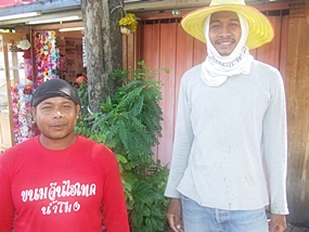 Charun Sunrang (left) and friend Supoj Praisang (right) are proud to be helping build the kingdom’s infrastructure.