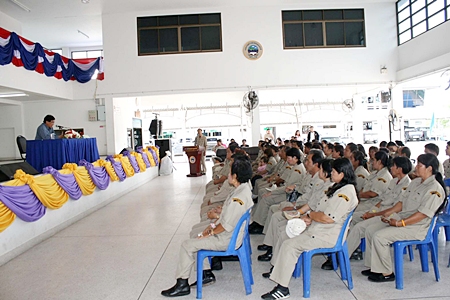 Sattahip District Chief Chaichan Iamcharoen (left) addresses the city’s latest civil defense volunteer trainees. 