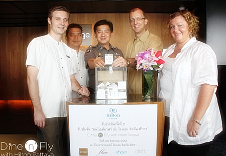 (L to R) Simon Bender, Food & Beverage Manager, Hilton Pattaya; Montree Sattham, Director of Human Resources, Hilton Pattaya; Pol. Maj. Aroon Promphan, Tourist Police Division Pattaya; Harald Feurstein, General Manager, Hilton Pattaya; Peta Ruiter, Director of Business Development, Hilton Pattaya. 