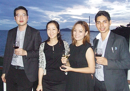 A pretty picture against a spectacular sunset. (l-r) Mike Meissner, Attapon Sangserpo, Nichanam and Rittiwat Bholat, Sales Consultant of Fragrant Property Ltd.