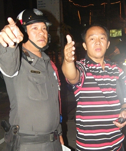 Wichai Tuengjeamsri tries to explain to police what happened. 