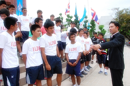 Pattaya City Mayor and United advisor Itthipol Kunplume gives a rousing speech to the junior Dolphins outside City Hall in the build-up to Coke Cup youth football tournament. 