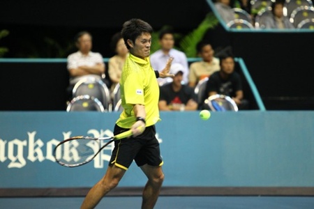 Thailand’s Danai Udomechoke hits a forehand to Fabio Fognini of Italy during their first round encounter in Bangkok on Monday, Sept. 26. (Photo/PTT Thailand Open)