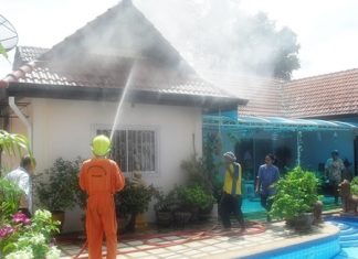 It took firefighters about an hour to fully extinguish the roof fire in Banglamung.