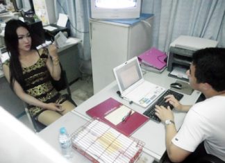 Pongkan Phichai reports the armed robbery to police.