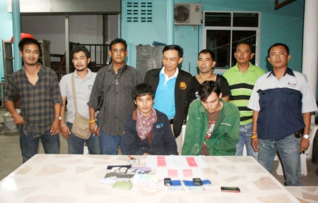 Rung Hokgenhul (right) and Rujiroj Theskhum have been arrested and charged with possessing 598 methamphetamine tablets. 